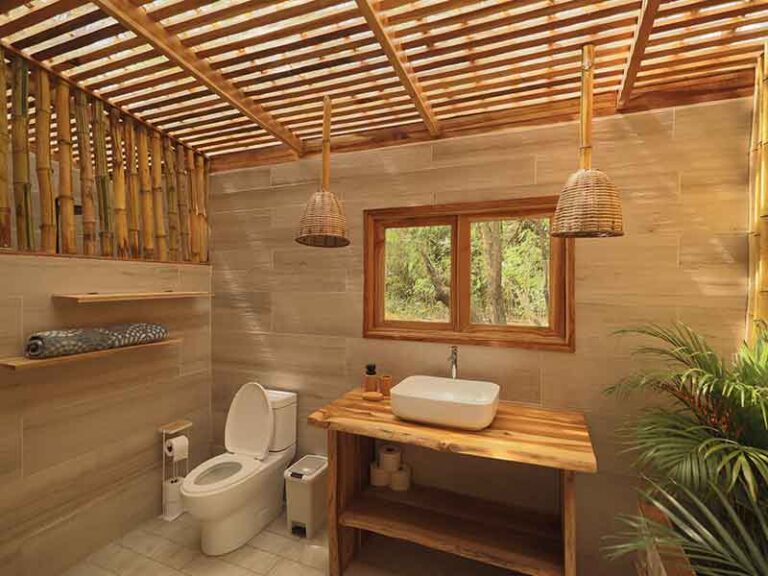 Tropical bathroom with wood finishes